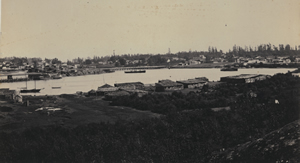 The landscape that is now Thunderbird Park can be seen in the centre background of this photograph of the Old Songhees Reserve, taken in 1860