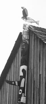 Close up of a Coast Salish pole in situ