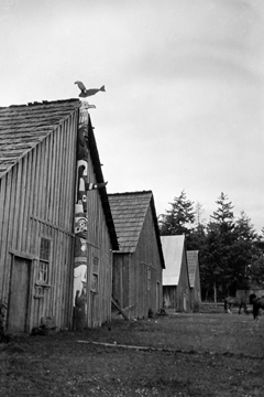 Totem pole with eagle figure on top in the new Songees Reserve