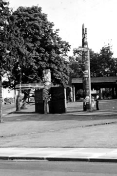 Nuxalk House Frontal Pole and Nuu-chah-nulth (Ahousaht) Ceremonial Screen taken from across the road