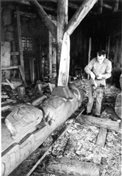 Henry Hunt carving a house post for the Jonathan Hunt House Display, 1967