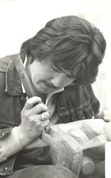 Tim Paul carving a mask