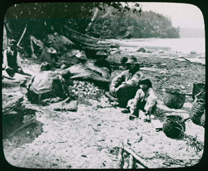 late 19th century photograph of people steaming clams in Cordova Bay